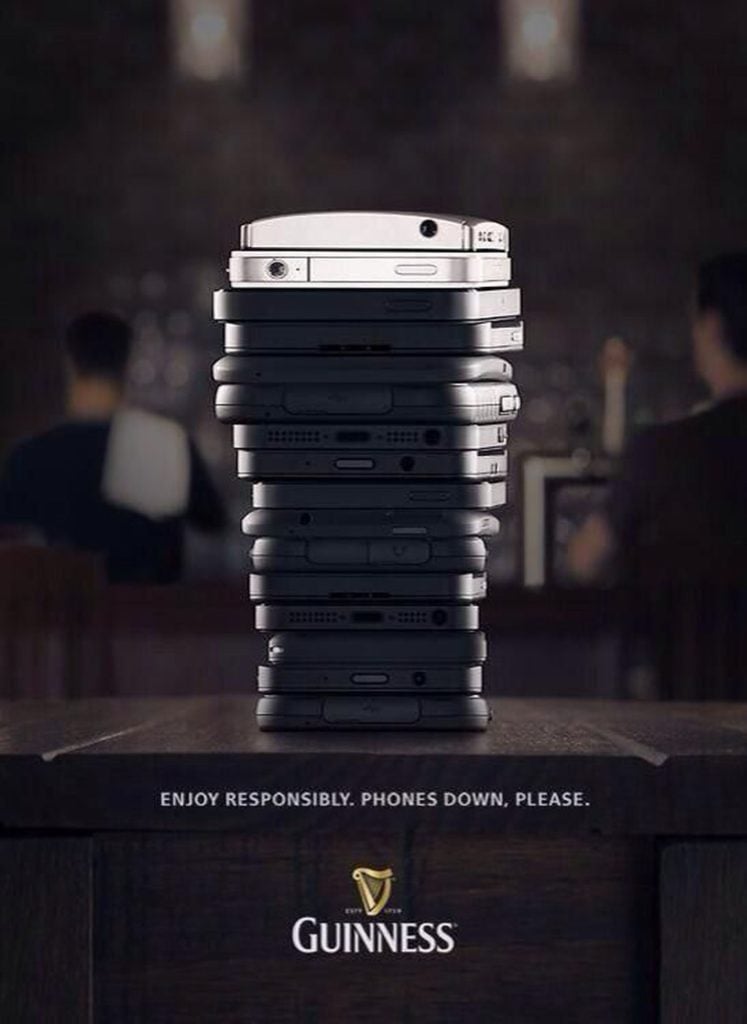 Clever Print Ads - Guinness - 'Enjoy responsibly. Phones down, please.'