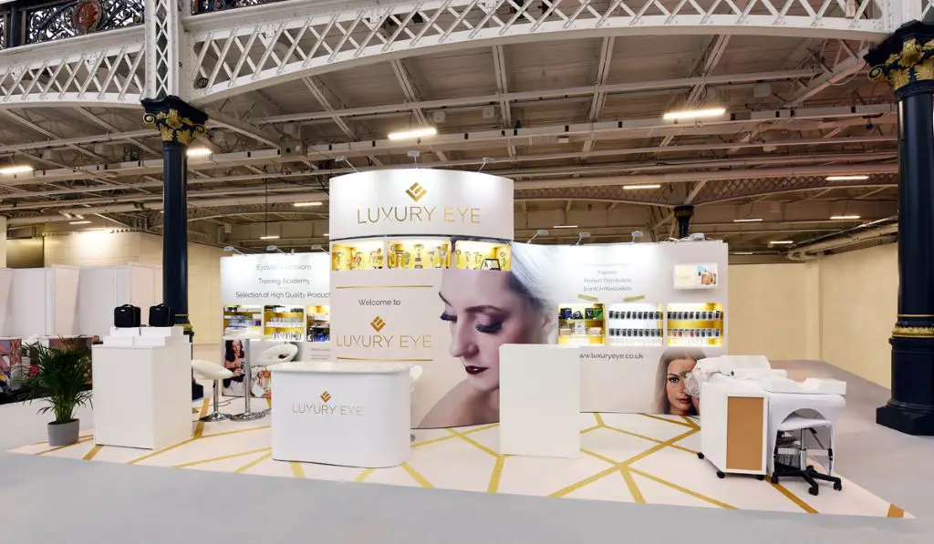 Large white exhibition stand large format graphic design