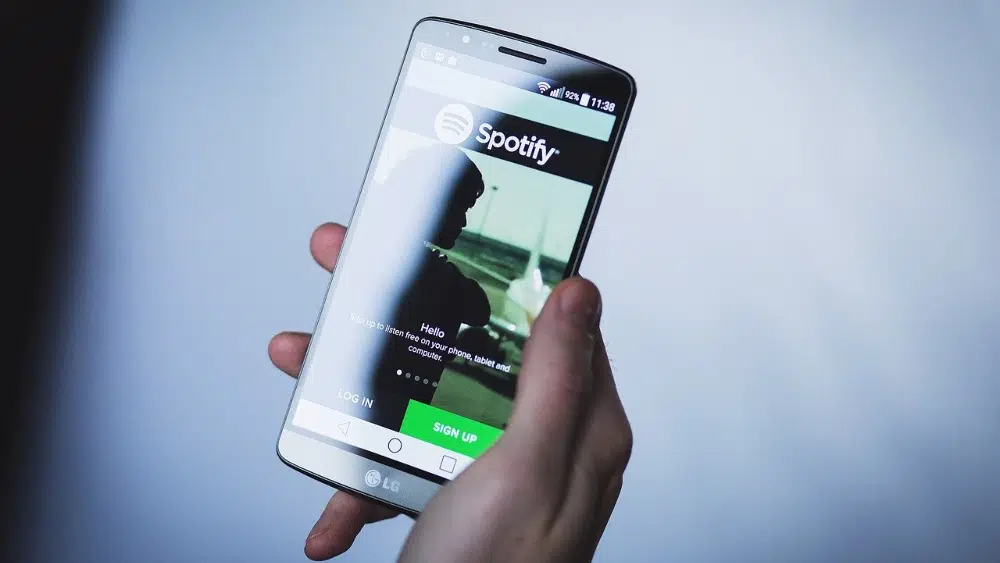 Excellent website branding examples - Spotify on smartphone